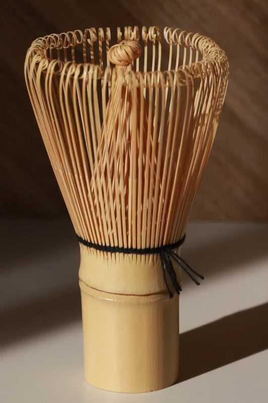 Bamboo matcha whisk (chasen) used for traditional Japanese matcha preparation. Traditional bamboo matcha whisk handcrafted for authentic matcha preparation. 