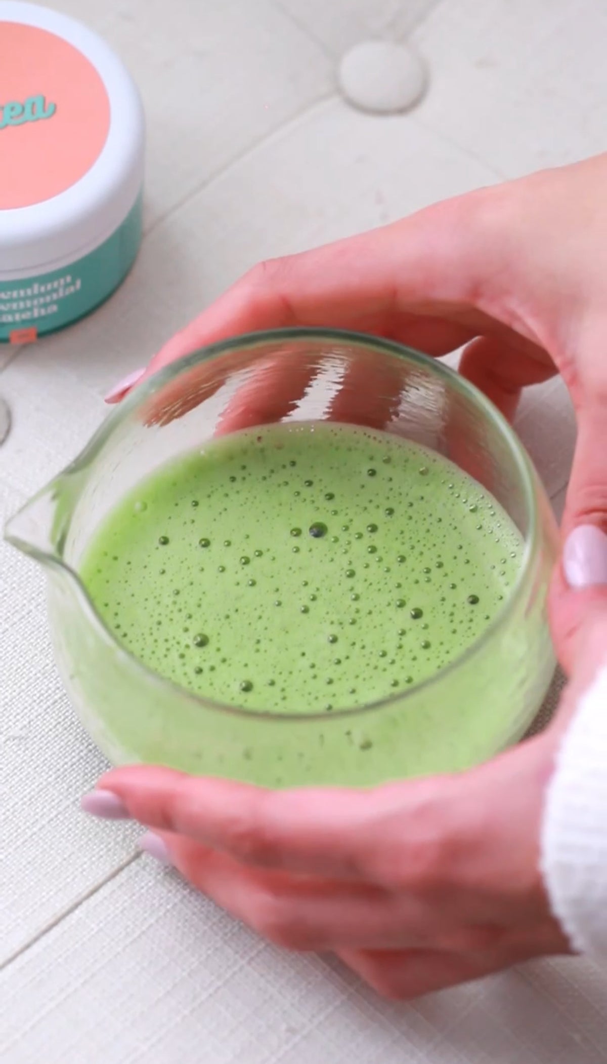 Freshly prepared ceremonial matcha with a smooth frothy texture. Japanese ceremonial matcha freshly prepared with a vibrant green colour and smooth foam