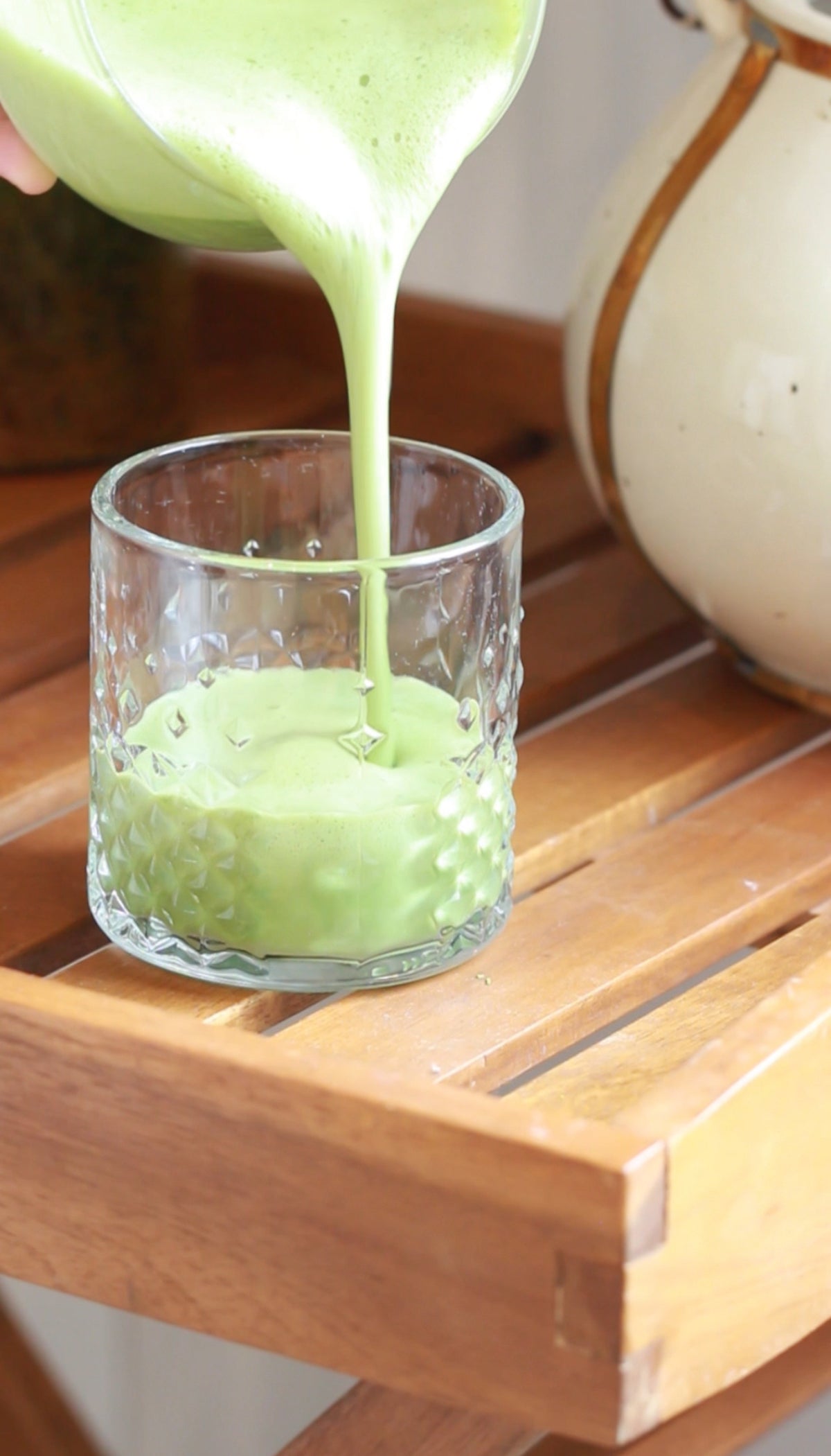 Pouring a creamy iced matcha latte made with ceremonial grade matcha. Hotea Ceremonial Matcha. Preparing an iced matcha latte with premium Japanese ceremonial matcha